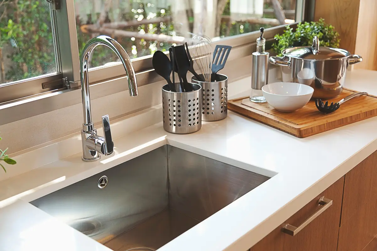 A stainless steel kitchen sink