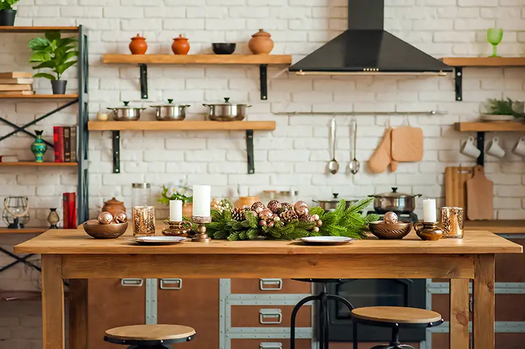 Kitchen with minimal christmas decor on the dining table